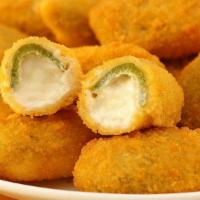 Jalapeno Poppers  · Breaded jalapenos, stuffed with cream cheese and served with ranch