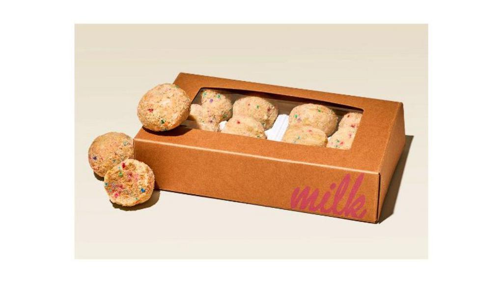 Milk Bar Birthday Truffles (12 Count) · Rainbow-flecked, vanilla-infused cake bites, coated in a barely-there drizzle of white chocolate and rolled in B’day crumbs.