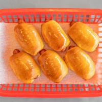 Dozen Of Pig In The Blankets · Dozen of house special sausage rolls with cheese