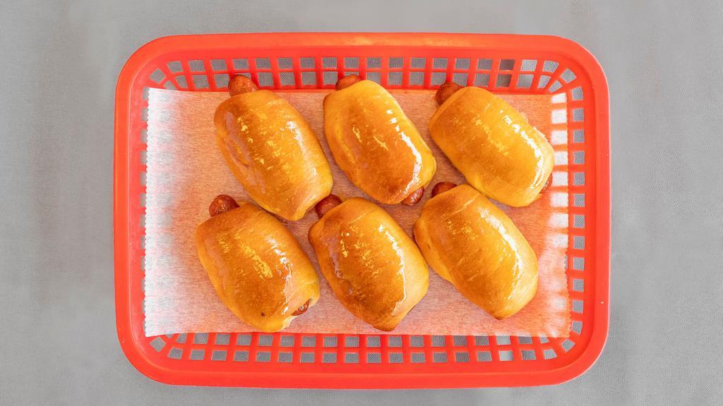 Dozen Of Pig In The Blankets · Dozen of house special sausage rolls with cheese