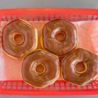 Dozen Chocolate Glazed · Dozen of chocolate glazed donuts