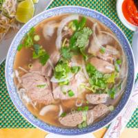 Pho Central · (1 size only) Eye round steak, well-done flank, fatty brisket, soft tendon beef tripe, and b...