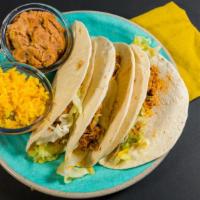 Soft Tacos (3) · Beef or chicken, with lettuce, tomato, and cheese. Served with rice and beans.