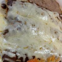 Chicken Enchiladas De Mole · Chef selection. Made with our own special molé sauce, topped with chihuahua cheese and sour ...