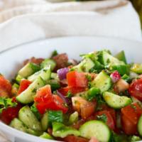 Mediterranean Salad · Gluten-free. Tomato, onion, cucumber, radish, bell pepper, mint, olive oil, and lemon juice.