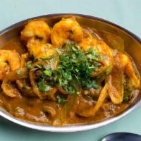 #271 Karahi Shrimp · Prawns stir fried with bell peppers, onions, tomatoes, and spices.