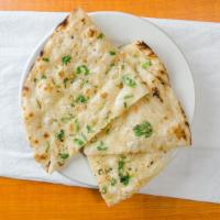 #453 Garlic Naan · Leavened bread baked with garlic.