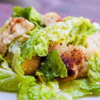 Caesar Salad Small · Romaine lettuce, homemade Caesar dressing, parmesan cheese, and croutons