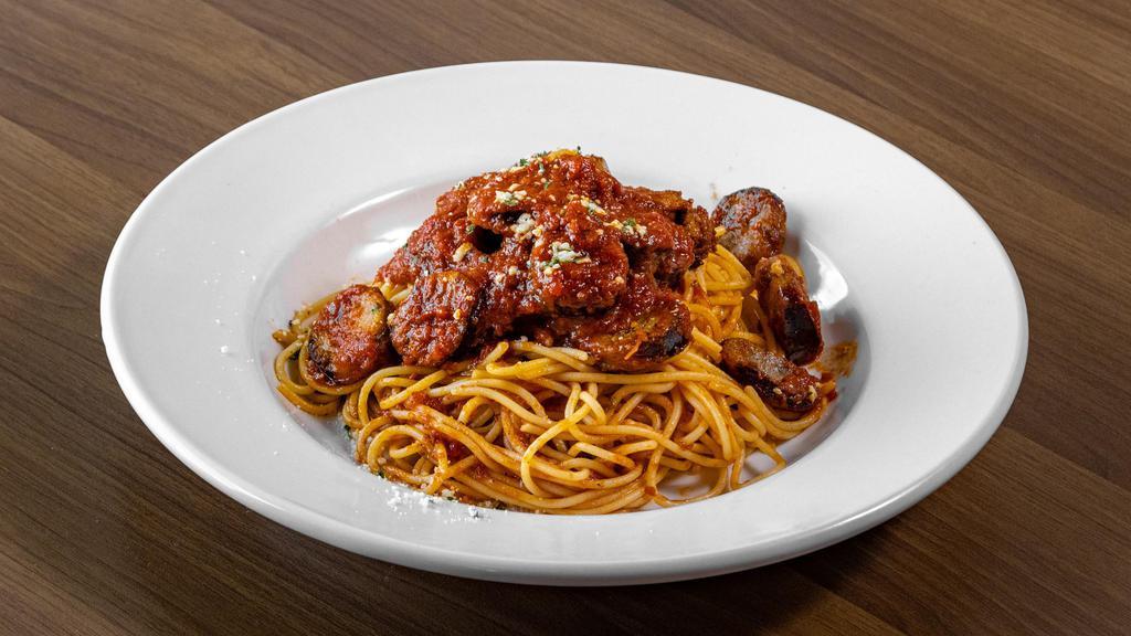 Spaghetti With Meatballs Or Italian Sausage · Traditional Spaghetti with marinara sauce served with meatballs or Italian sausage