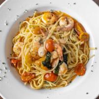 Shrimp Scampi · Linguine pasta, jumbo shrimps, cherry tomatoes, fresh garlic, fresh basil tossed in lemon bu...