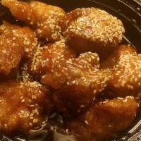 Sesame Chicken · Tender, crispy chicken sauteed in the chef's special sauce with sesame.
