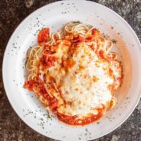 Chicken Parmigiana · Chicken breast lightly breaded, sauteed in a red sauce and topped with mozzarella cheese.