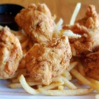 Kid Chicken Bites · Bites of all white meat chicken breast, made Crispy or Grilled. Served with your choice of S...