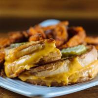 Kid Grill Cheese · American Cheese, melted between white bread, garnished with pickle slices. Served with your ...