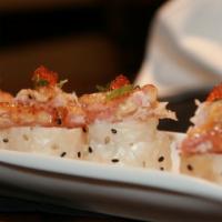 Spicy Crab Roll · Snow Crab Meat Broiled in a Mayo Glaze with Spicy
Japanese Red Pepper