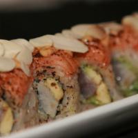 Salmon Lady Roll · Cooked Salmon & Avocado Topped With Seared Spicy Salmon & Toasted Almonds
