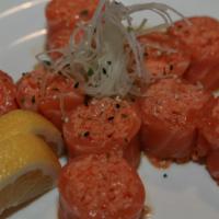 Butterfly Kiss Roll · Spicy Crab Meat Wrapped with Fresh Salmon & Splash of Lemon