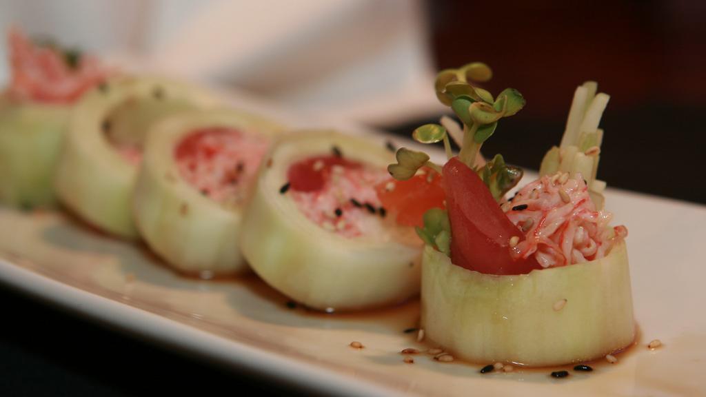 Fujiyama Roll · Radish Sprout, Pickled Radish, Yamagobo, Tuna, Crab Meat, Salmon Wrapped, with Cucumber