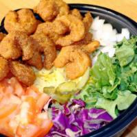 Shrimp Over Rice · Served with our Signature Exotic Basmati Rice, Lettuce, Onions, Tomatoes, Red Cabbage, and a...