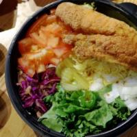 Fish Over Rice · Served with our Signature Exotic Basmati Rice, Lettuce, Onions, Tomatoes, Red Cabbage, and a...