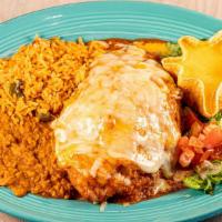Chile Relleno · One poblano pepper stuffed with ground beef or chicken, topped with red sauce and Monterey J...