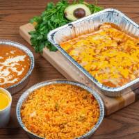 Enchilada Family Pack! · One Dozen Cheese, Ground Beef or Chicken enchiladas. 
Served with Rice, Refried Beans & a la...
