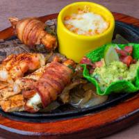 No Name Plate · Beef and chicken fajitas, chicken diablo, shrimp brochetas, grilled shrimp and queso del mar...