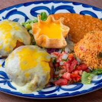 Stuffed Avocado · Two fried avocado halves stuffed with chicken fajita, and Monterey jack cheese. Served with ...
