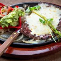 Carne Asada · A 10 oz choice skirt steak topped with Monterey cheese. Served with guacamole, pico de gallo...