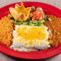Sour Cream Enchiladas · Three shredded chicken enchiladas covered in a sour cream sauce. Served with rice, beans & a...