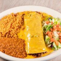 Texas Burrito · Large flour tortilla filled with ground beef, topped with chile con queso. Served with rice ...
