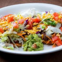 Tostadas · Two ground beef or chicken tostadas. Served with lettuce, tomatoes, beans, cheese, sour crea...
