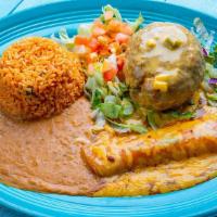 El Valiente · One fried avocado half stuffed with chicken or beef
fajita topped with chile con queso. Serv...