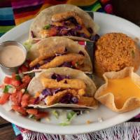 Fish Tacos · Grilled or fried hand-battered tilapia topped with cabbage and mi rancho special sauce. Serv...