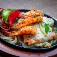 Tototlan · Three jumbo shrimp and one eight ounce chicken breast topped with Monterey Jack cheese. Serv...
