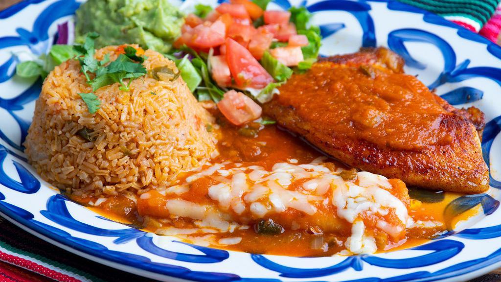 Cancun · Grilled tilapia fillet topped with mi rancho special oregano sauce. Served with one cheese enchilada, rice, charro beans and tortillas. Substitute shrimp for an additional charge.