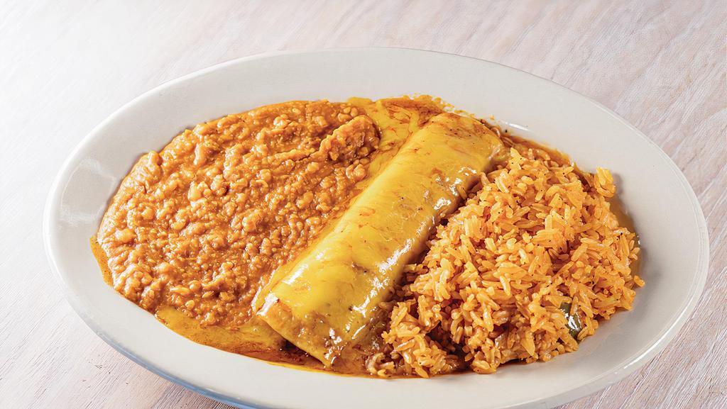 Enchilada · Served with rice and beans.