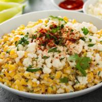 Mexican Street Corn · Sautéed corn blended with Lime Crema and topped with Cotija cheese, cilantro, and spices.  R...