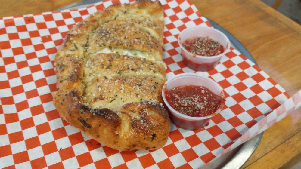 Mcknight Calzone · Feeds 2 or More
5 Toppings w/3 Sides of Marinara