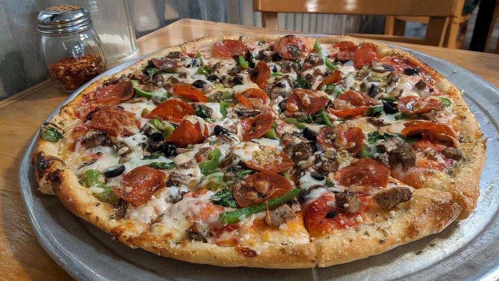 The Works · Pepperoni, Sausage, Bell Peppers, Red Onions, Black Olives, Mushrooms