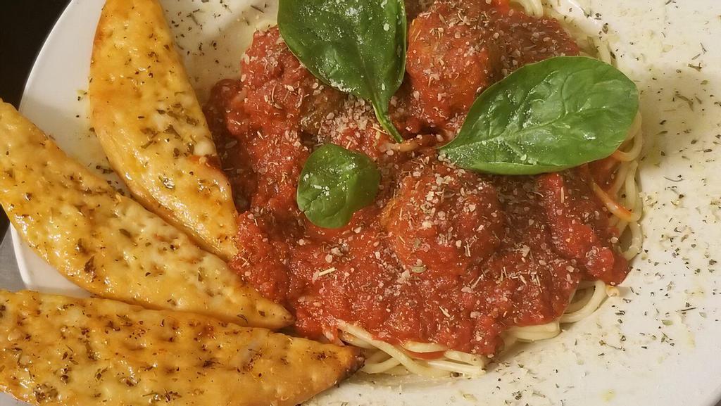 Spaghetti With Meatballs · Spaghetti Tossed in Our Homemade Marinara Sauce & Meatballs