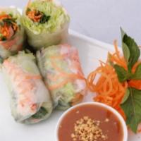 Fresh Basil Rolls · Shrimp, fresh lettuce, cilantro, carrots and fresh basil wrapped in rice paper and served wi...