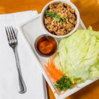 Chicken Lettuce Wraps · Minced chicken stir-fried with water chestnuts, peanuts, carrots, and onion served with fres...