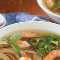 Pho Seafood · Vietnamese rice noodle soup with seafood combo: shrimp, squid, crab.
