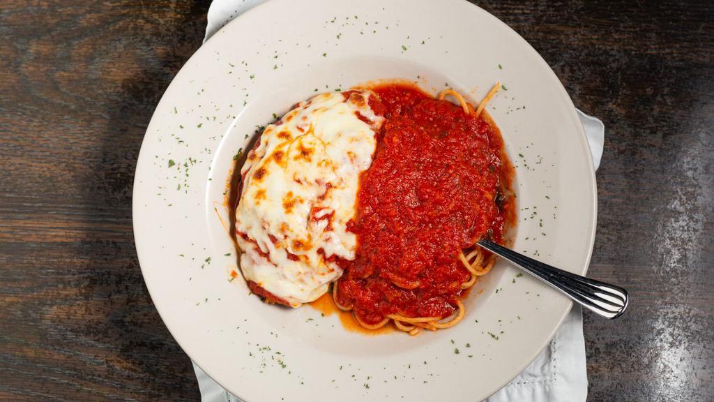 Chicken Parmigiana · Chicken breast lightly breaded. Served in red sauce with mozzarella cheese.
