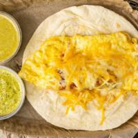 Bacon, Egg And Cheese · Comes in a 6 inch flour tortilla. Scrambled eggs, crispy bacon and topped it up with mix che...