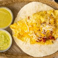 Chorizo, Egg, And Cheese · Comes in a 6 inch flour tortilla, scrambled eggs mixed with chorizo and topped with a mix ch...