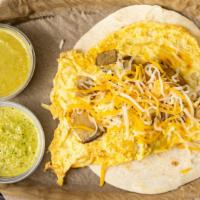 Potato, Egg, Cheese · Comes in a 6 inch flour tortilla, scrambled eggs mixed with potatoes, and topped with mix ch...