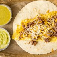 Beef, Eggs, And Cheese · Comes in 6 inch flour tortilla, scrambled eggs, beef, and topped with mixed cheese.