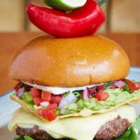 El Luchador Burger · Grilled jalapeno, pepper jack, guacamole, chipotle mayo, tostada, pickled red onion.